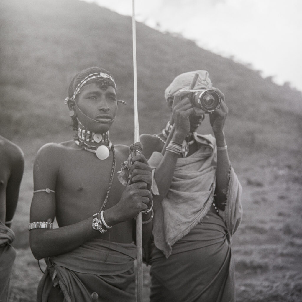 Passing the lens – a young Turkana warrior tries his hand at photography.