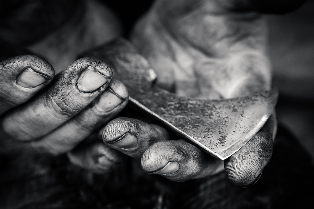 The hands of Blacksmith Alex Pole by Tim Booth